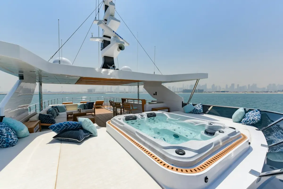 Majesty 120 sun deck with Jacuzzi and lounge seating