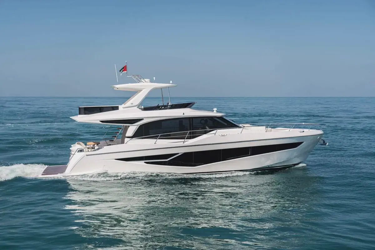 Majesty 60 flybridge yacht underway on open water